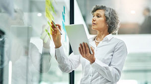 woman holding notepad