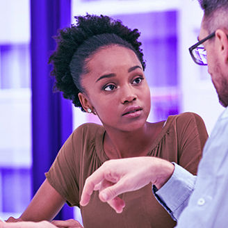 women and men discussing banner