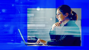 women looking at laptop windowed