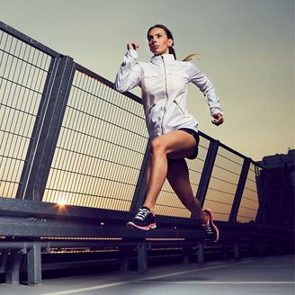 Women running on bridge