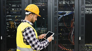 A worker inspecting server infrastructure