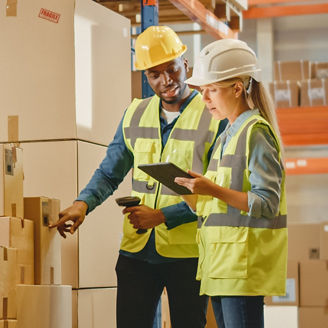 Warehouse workers conducting inventory checks
