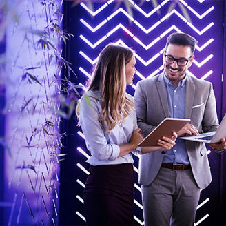 Woman and man laughing to each other