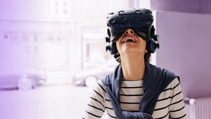 Woman with VR smiling