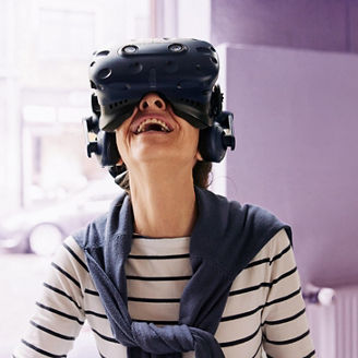Woman with VR smiling