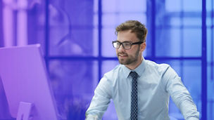 Young businessman working at office