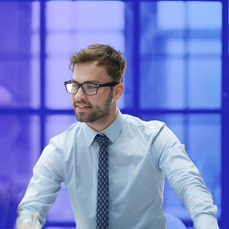 Young businessman working at office