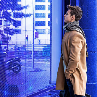 Man looking at window with reflection