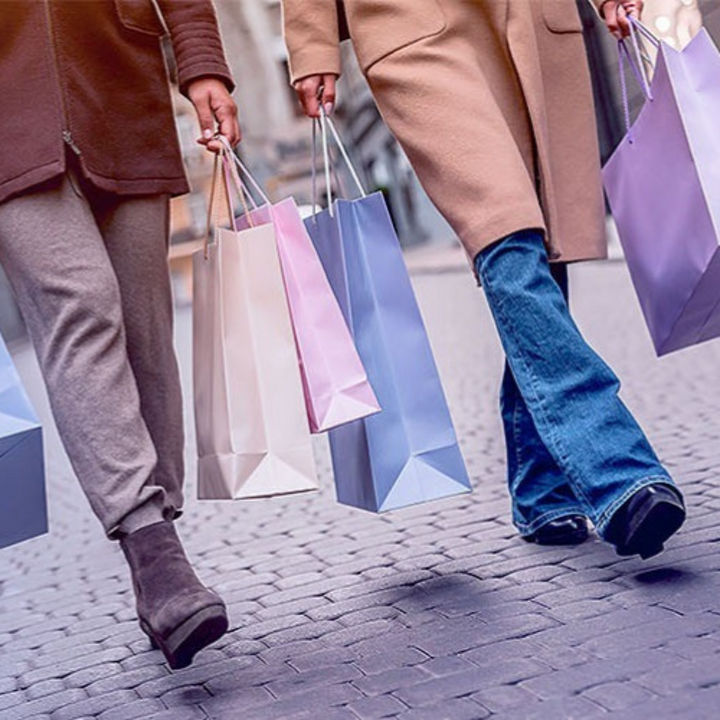 Two people with bags